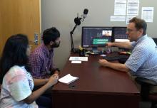 Dr. Fitzkee works with Dan and Radha on video edits with Davinci Resolve.